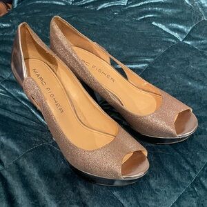 Size 10 high heels by Marc Fisher 3/4 silver/gold glitter, 1/4 metallic silver